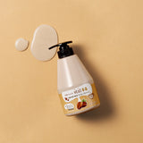 Rich and foamy Kwailnara Coffee Milk Body Cleanser, a K-beauty essential for nourishing and revitalising skin while leaving a subtle coffee fragrance.