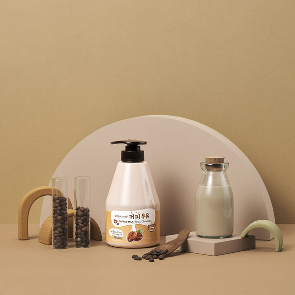 Kwailnara Coffee Milk Body Cleanser in a luxurious setting, featuring moisturising milk essence and coffee for smooth, radiant skin in Korean body care.