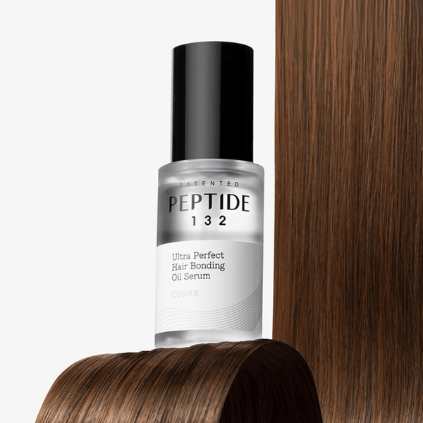 Lightweight COSRX PEPTIDE-132 Hair Bonding Oil Serum with peptide complex and botanical oils for stronger, glossy, frizz-free hair