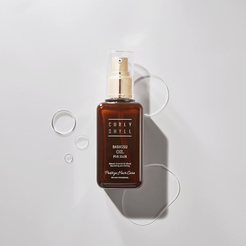 Frizz-control hair oil with babassu extract for soft, shiny hair