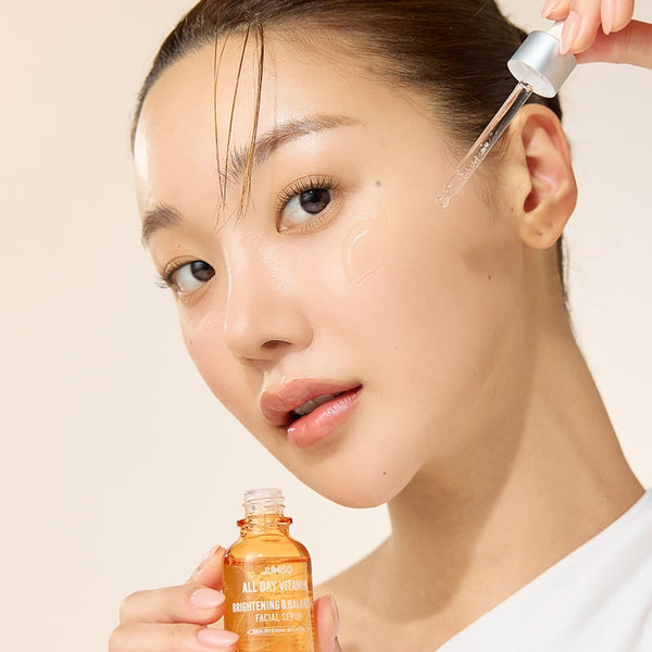 JUMISO Vitamin Serum bottle featuring vitamins C, A, D, E and K, designed to even skin tone, hydrate, soothe and improve post-acne marks.