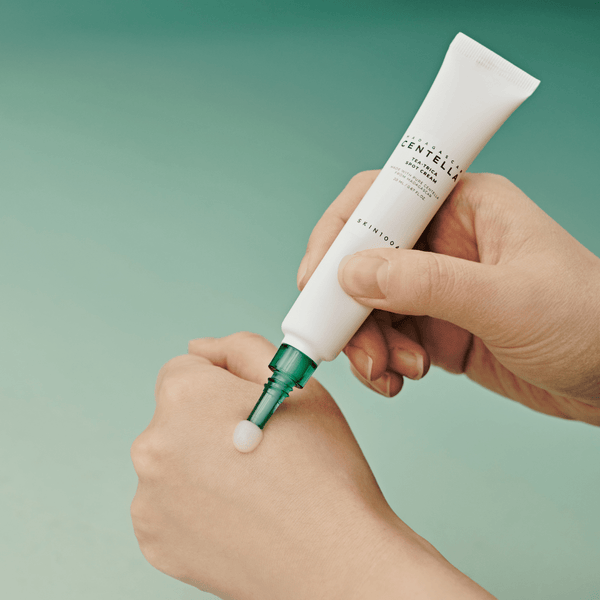 Tube of SKIN1004 Centella Tea-Trica Spot Cream, a blemish-clearing Korean skincare product formulated to purify pores, control excess oil and treat active acne spots.