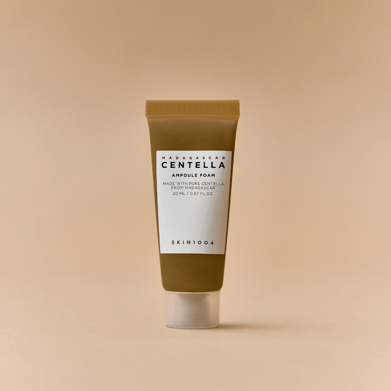 Travel-friendly SKIN1004 Centella Ampoule Foam 20ml mini tube, a K-beauty foaming cleanser that removes impurities, calms redness and hydrates sensitive skin.